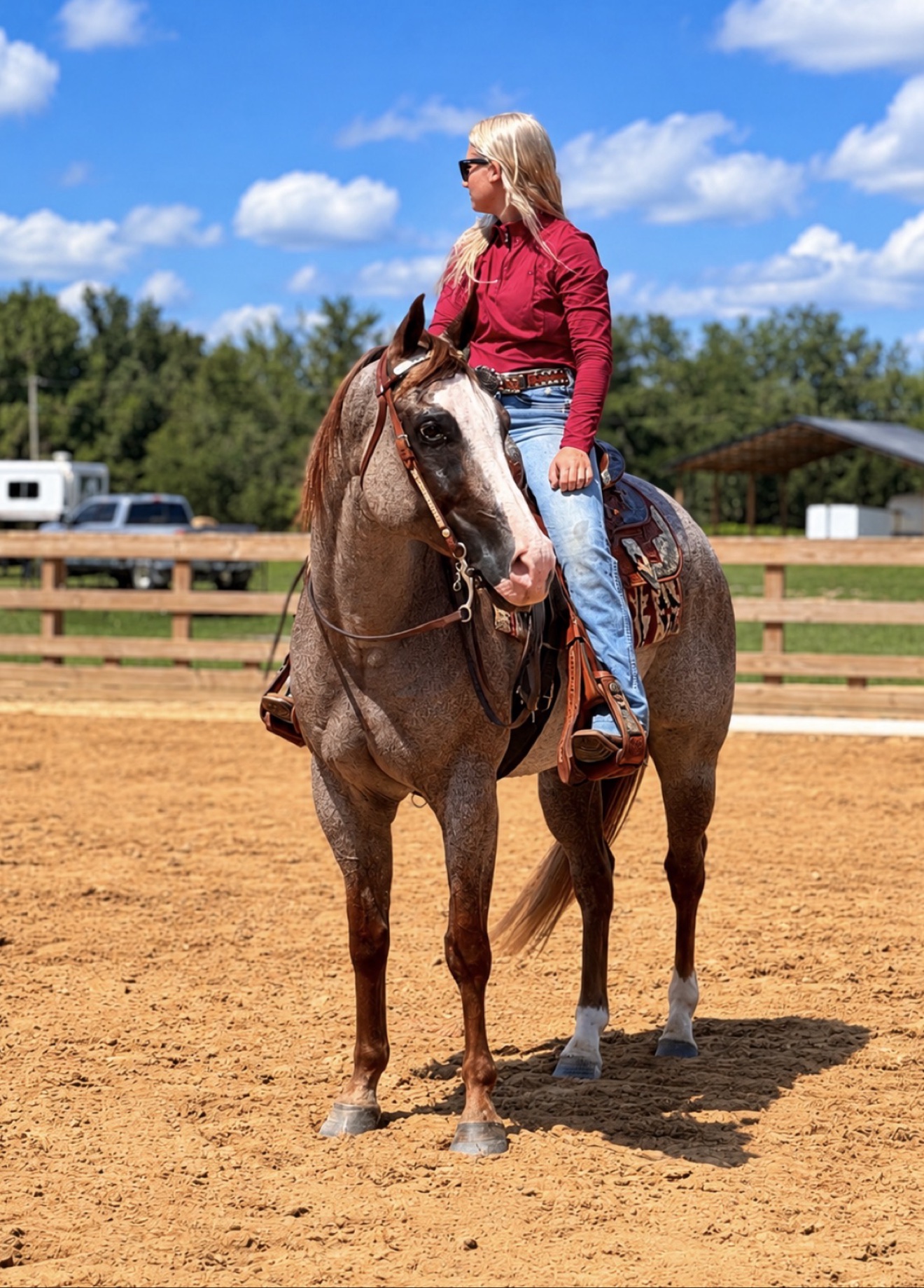 Closer view of Hayley riding Struttin Cowboy in the arena